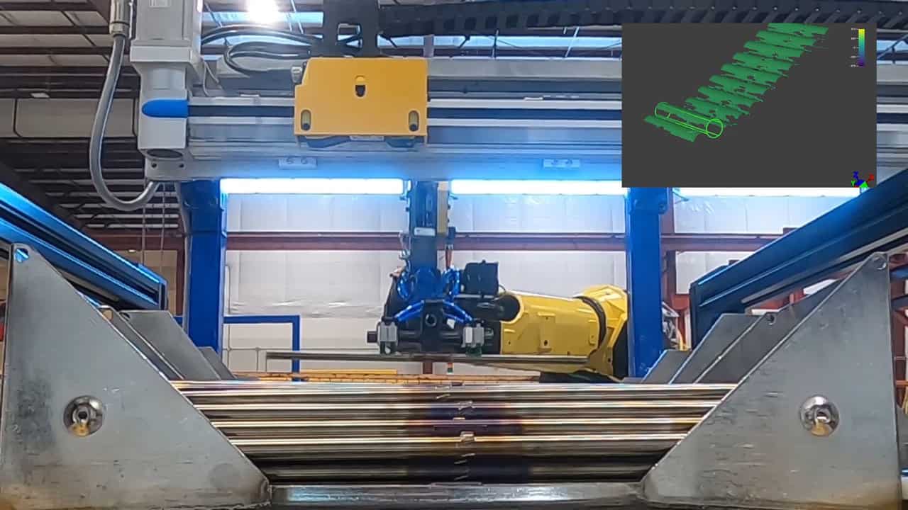 Robot amarillo recogiendo piezas de un contenedor guiado por una cámara de visión amarilla