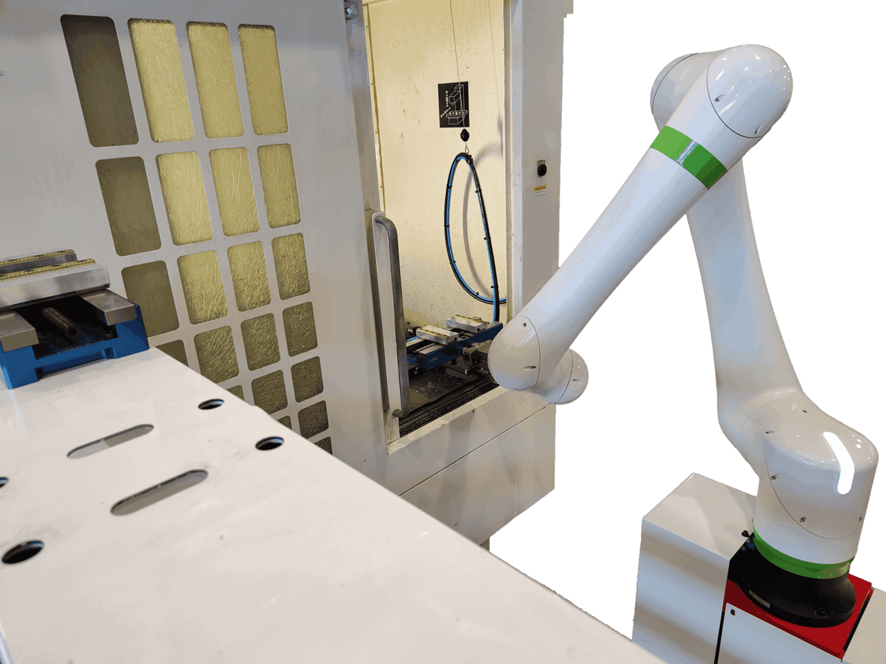 BOS Compact Non-Vision Guided robotic machine tending solution loading parts to a lathe machine